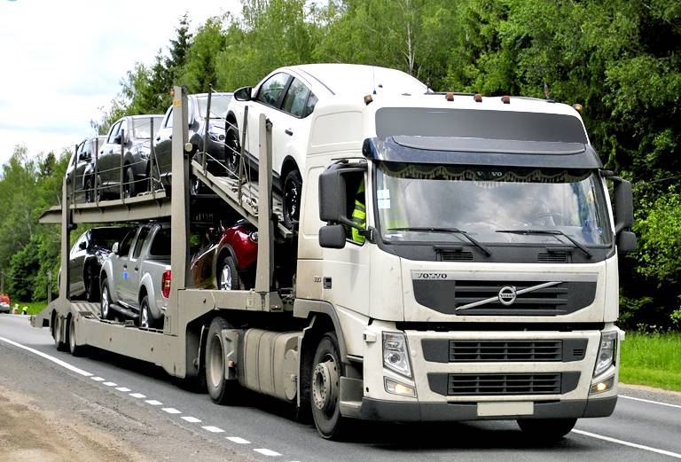 Перевезти перевозку трактора амкодор цены из Нижнекамск в Оренбург